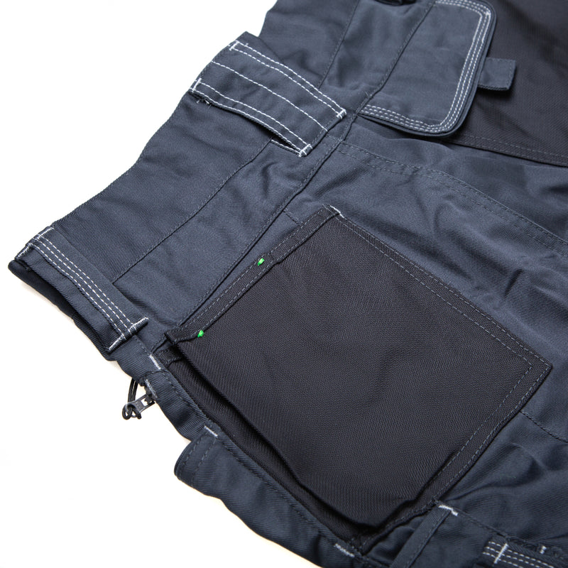 Close-up on the durable fabric and button of the ATS cargo shorts.