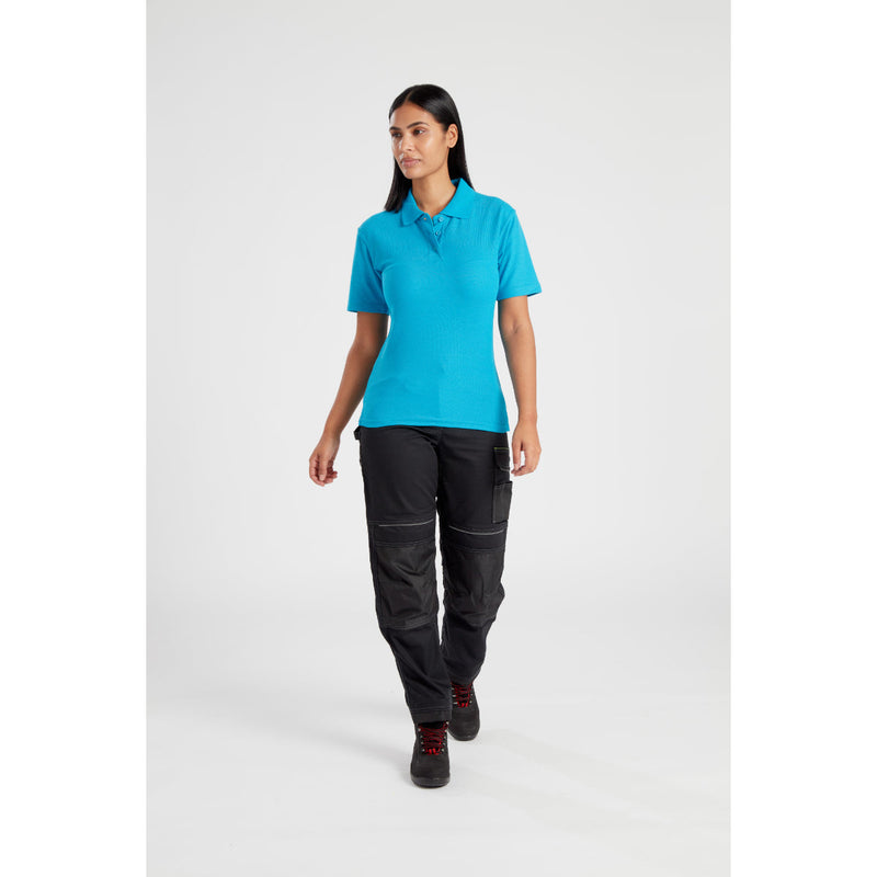 Model looking over her shoulder while wearing the PW3 Women's workwear.