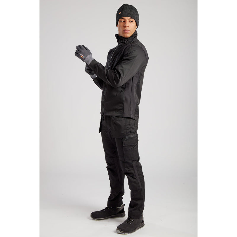 Portwest Eco Stretch black workwear with accessories on male model, stylish side view