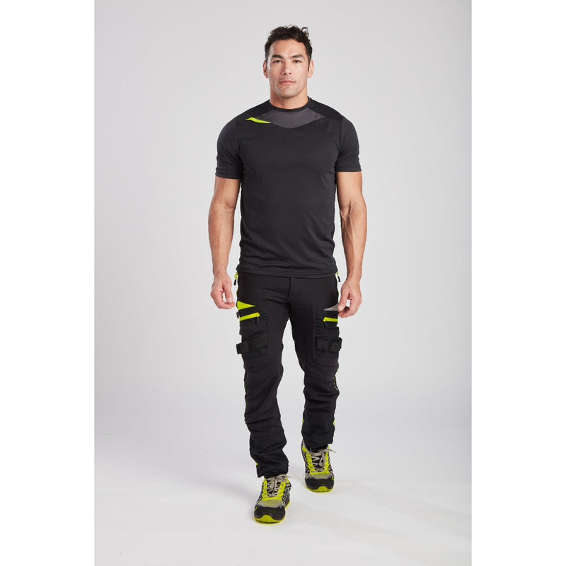 Full-length view of a worker wearing the work trousers.