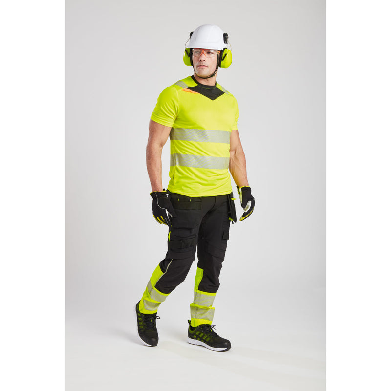 A model wearing Portwest work trousers and Supra KN Safety Glasses (PS10), showcasing on-the-job safety and comfort.