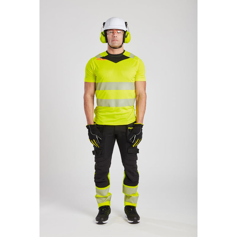 Model demonstrating the flexibility and protection of Portwest workwear, including the essential Supra KN Safety Glasses (PS10).