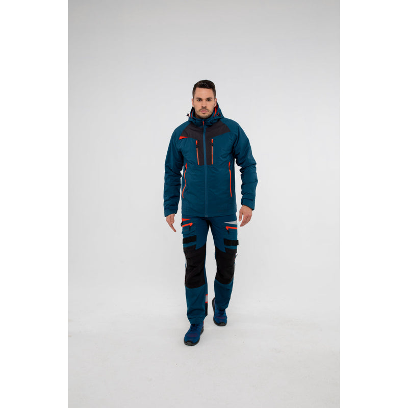 Model wearing the black Portwest DX4 jacket and slim-fit work trousers, front view.