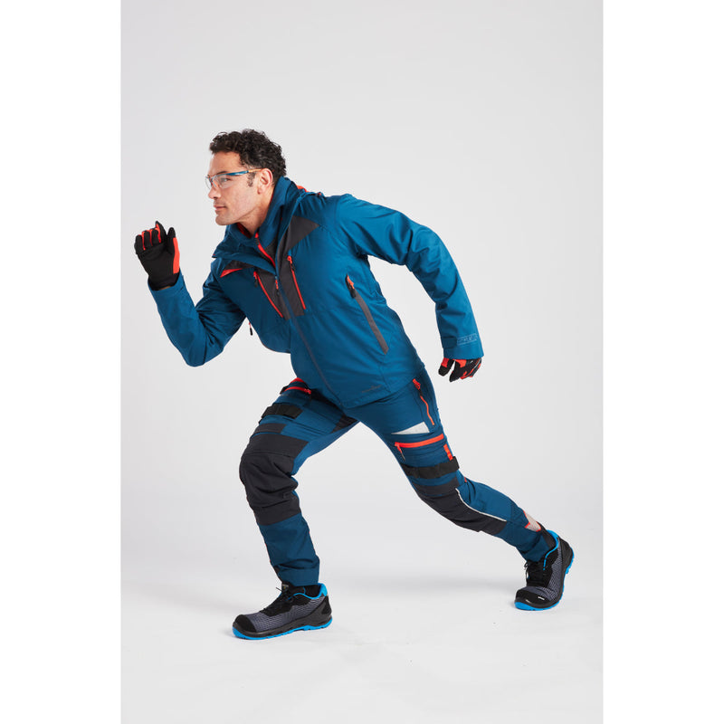Man in Portwest DX4 Quarter-Zip Hoodie showing off pocket details.