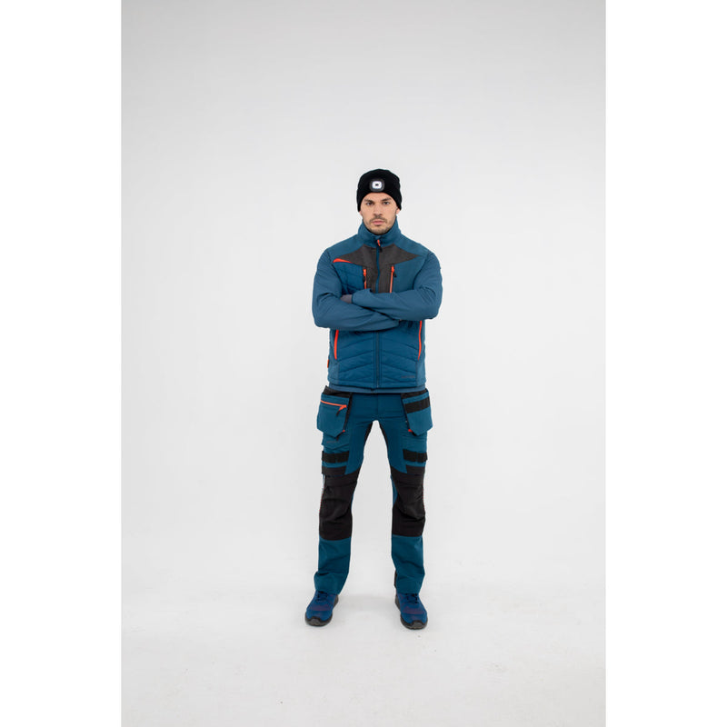 Profile of a man in Portwest DX4 Hybrid Baffle Jacket showing its comfortable fit.