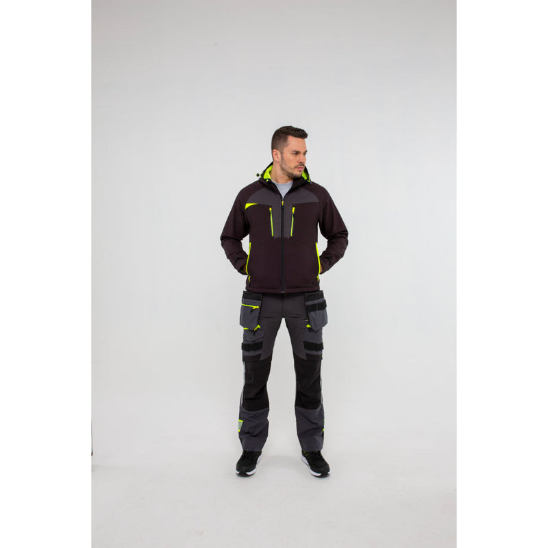 Man in Portwest DX4 Softshell 3L jacket showing the jacket's side profile.