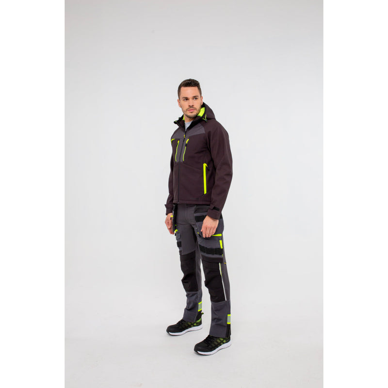 Man in Portwest DX4 Softshell 3L jacket showing comfortable fit and movement.