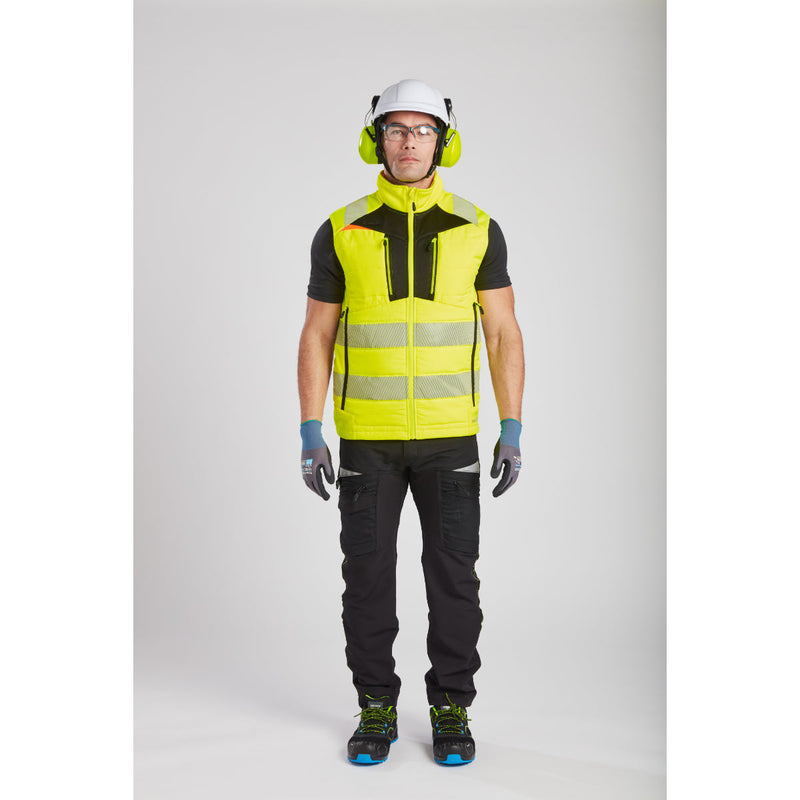 Man in Portwest DX4 Hi-Vis Softshell Bodywarmer showing side pocket access.