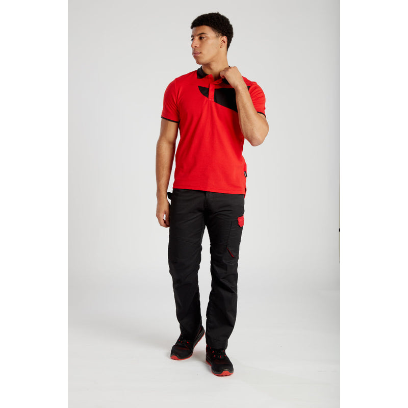 Man wearing a Portwest PW2 Cotton Comfort Polo Shirt black work pants and safety shoes.