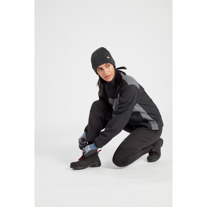 A complete view of a worker's Portwest outfit, topped with the B026 beanie.