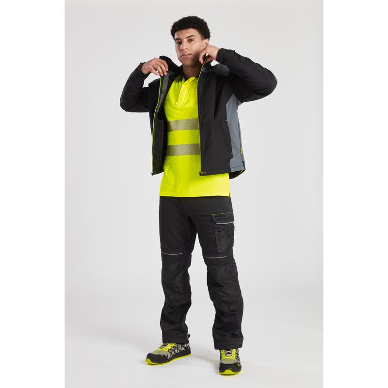 Model demonstrating the stretch and flexibility of the PW3 Lightweight Trouser.