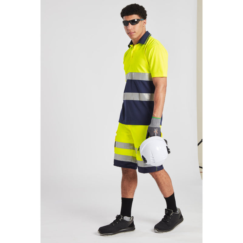 Model wearing a full Portwest hi-vis outfit including the Lightweight Poly-Cotton Shorts