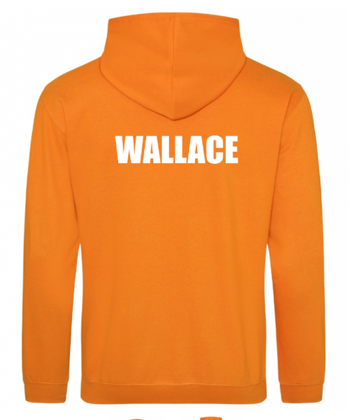 The detailed stitching of the Armadale crest on an ochre-colored kids' hoodie.