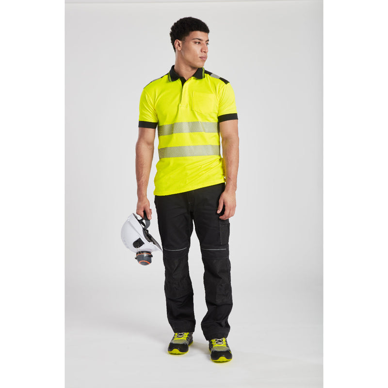 Model kneeling comfortably in the Portwest PW3 Lightweight Stretch Trouser.