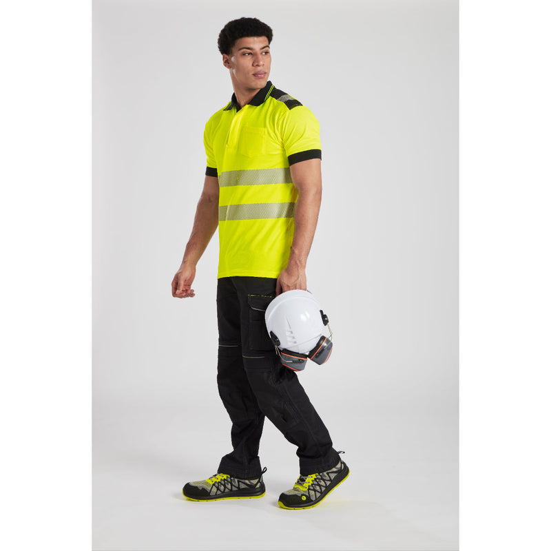 Rear view of a model in the full Portwest PW3 workwear outfit.