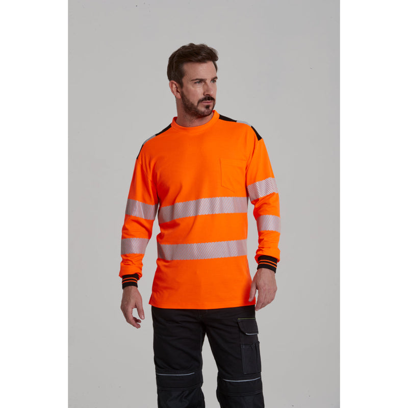 Man with arms crossed wearing the orange and black Portwest PW3 hi-vis t-shirt.