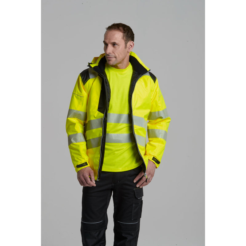 An alternative angle of a worker in the hi-vis winter jacket at a job site.