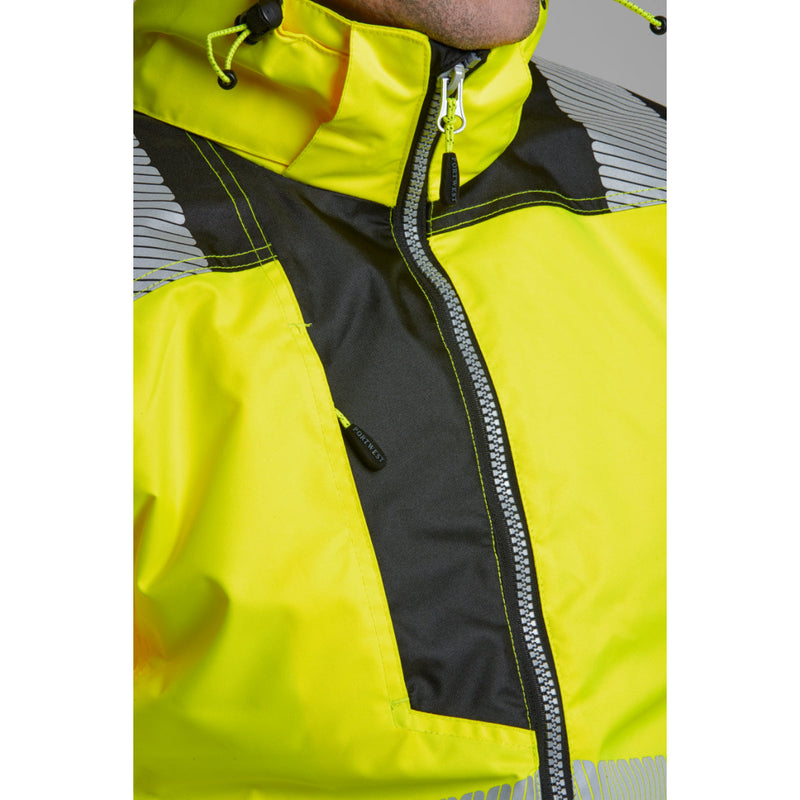 A man looking to the side while wearing the Portwest hi-vis winter jacket.