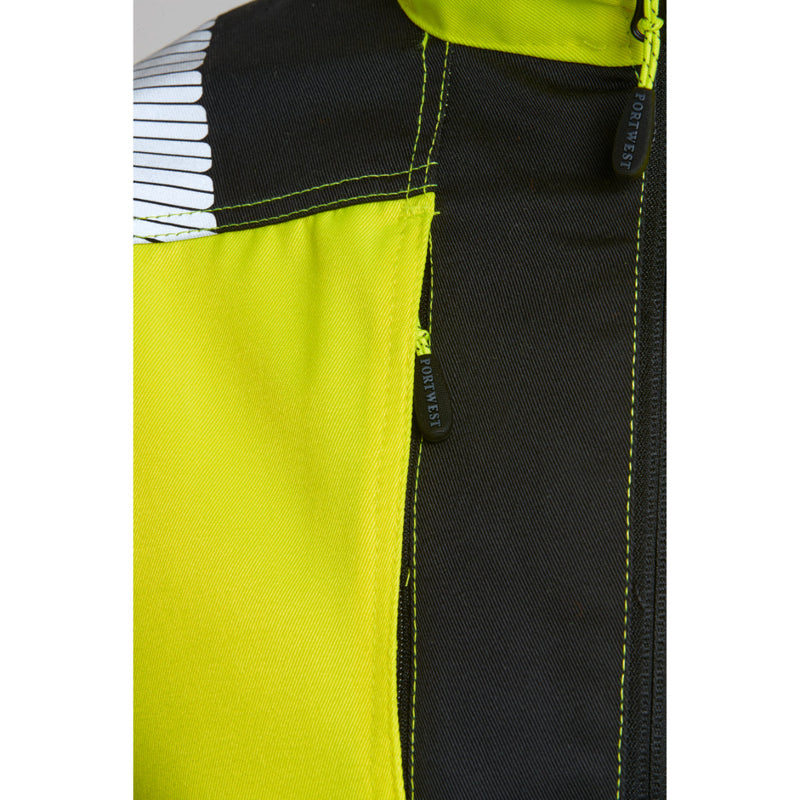 Man with the hood up on the Portwest PW3 hi-vis work jacket.