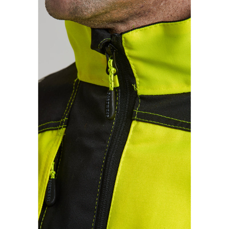 Close-up on the adjustable cuff strap of the hi-vis work jacket.