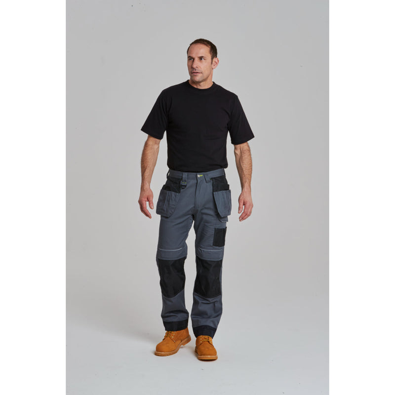 wearing the Portwest PW3 holster work trousers, showing the fit and side pockets.
