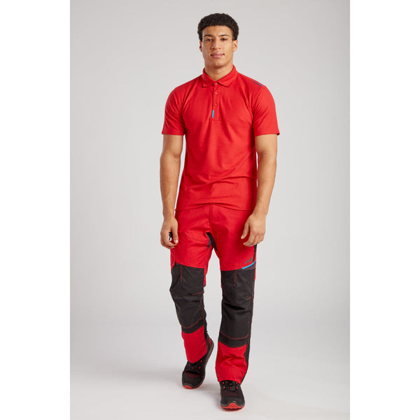 Worker wearing the Portwest WX3 work trousers and safety boots,
