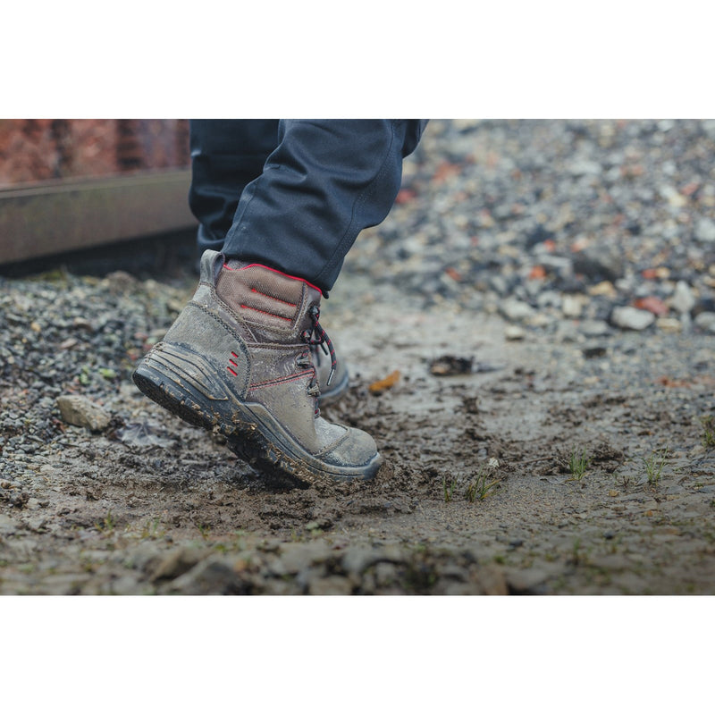 Detail of the eyelets on the brown 308C safety boot.