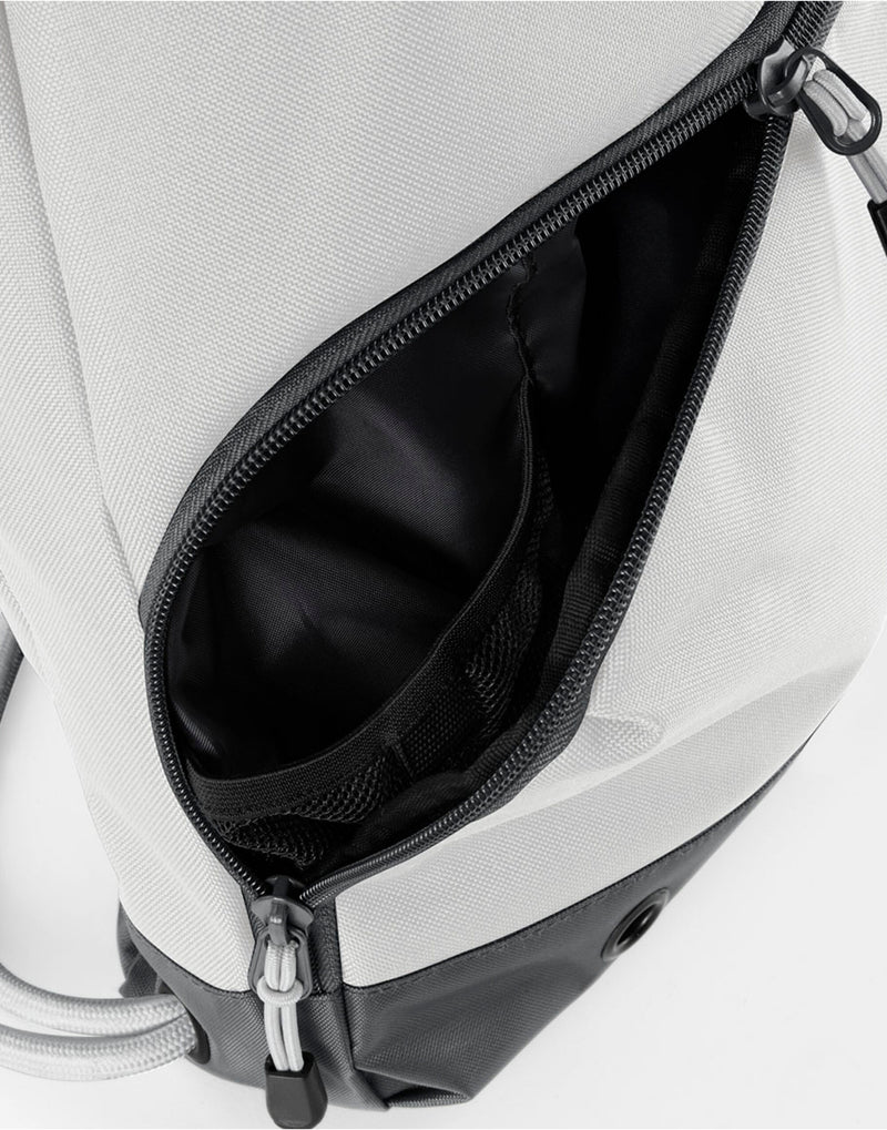 Angled shot of the black Bagbase Athleisure Gymsac, highlighting its dual-fabric design.