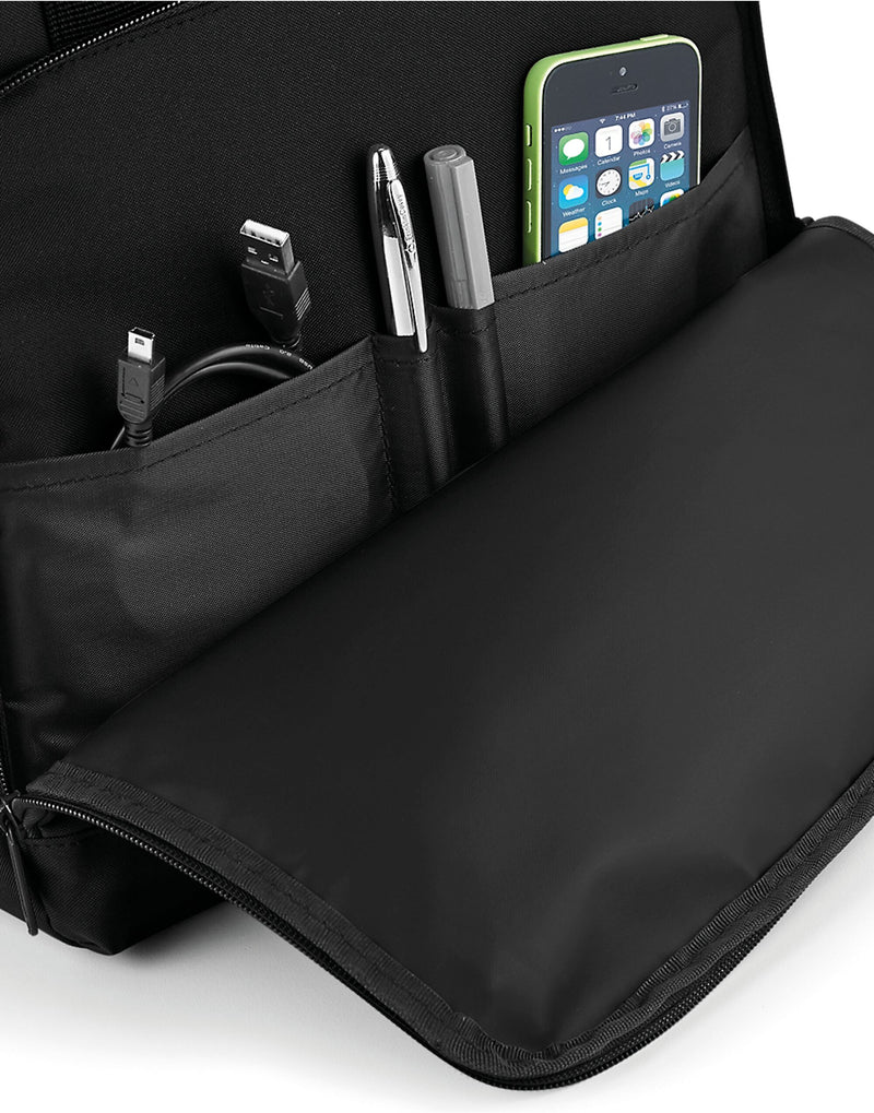 Close-up of the buckle on a black Bagbase Twin-Handle Roll-Top Backpack.