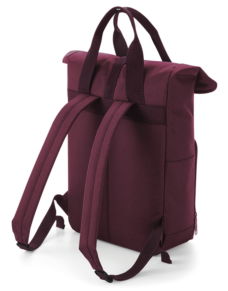 A red Bagbase Twin-Handle Roll-Top Backpack from a direct front angle.