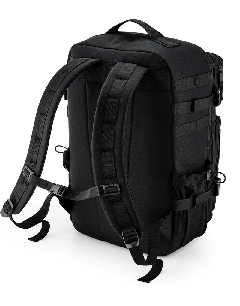 The cross-body bag with strap detached, held as a clutch.