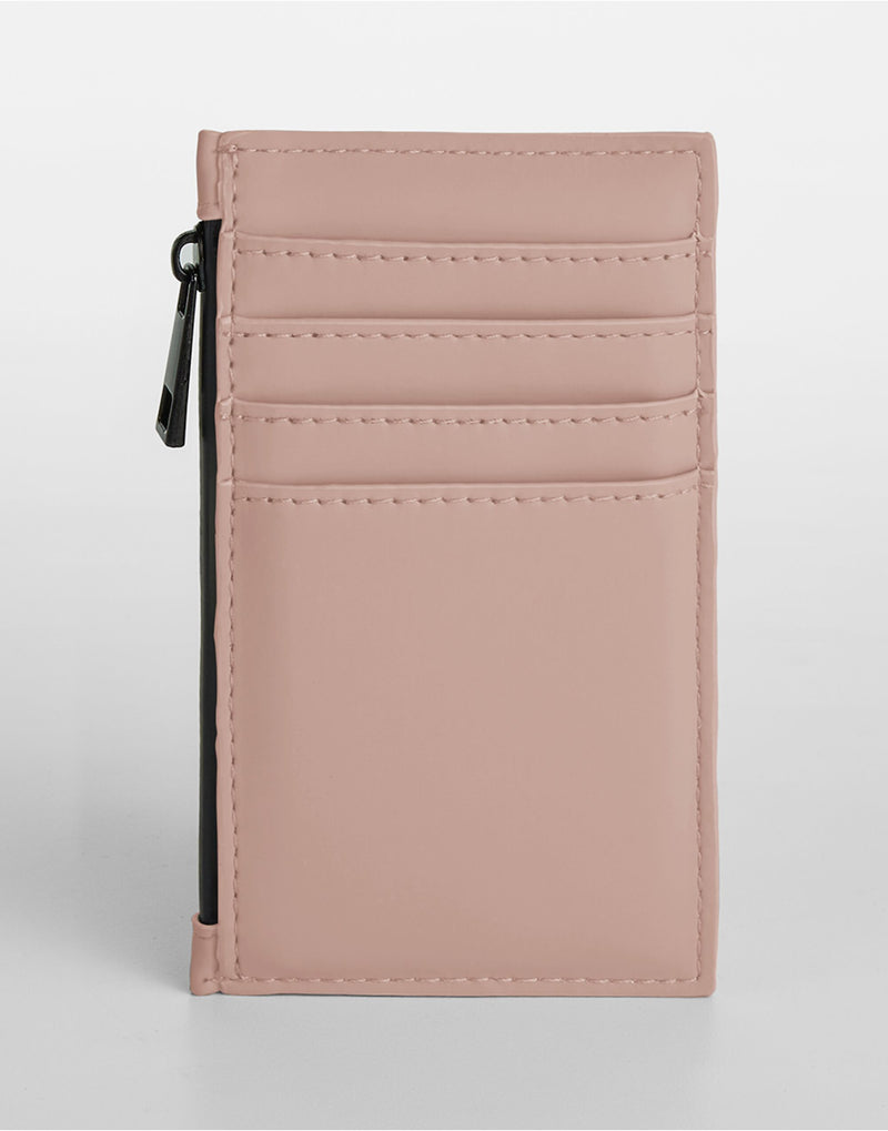 Close-up view of the stitching on the pink card holder.