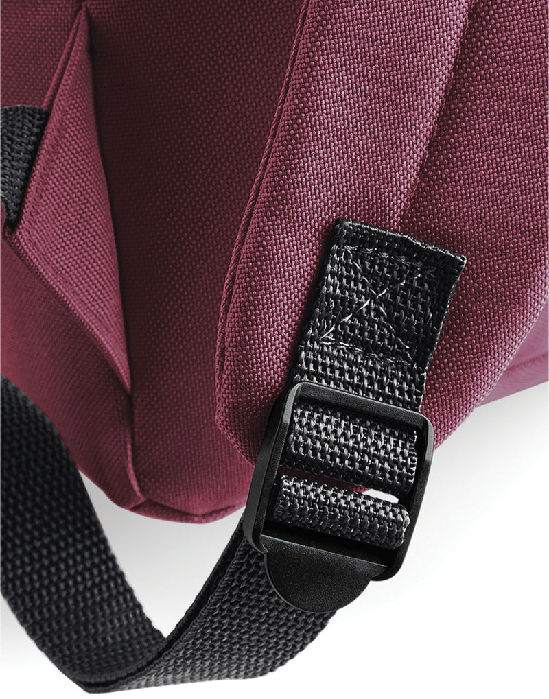 Front view of the olive Burgundy Bagbase Maxi Fashion Backpack.