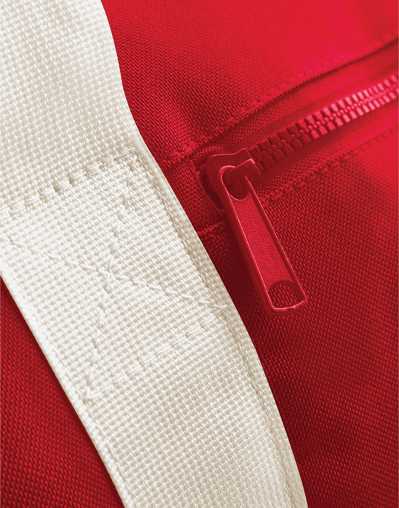 Grey Modulr backpack with detachable pocket attached.