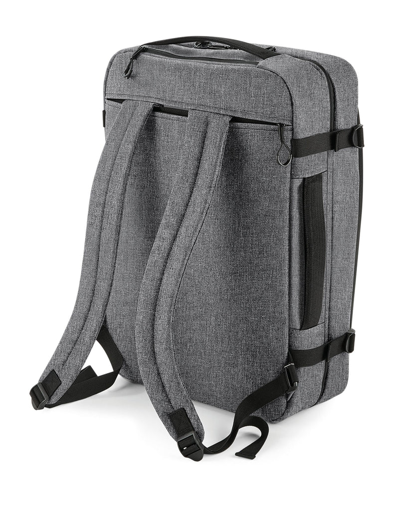 Detail of the front organizer pocket on the Bagbase Escape Carry-On Backpack, perfect for documents and electronics.