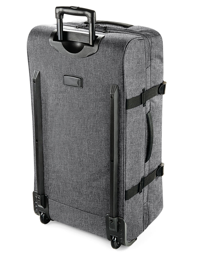 Close-up of the integrated stand and smooth-rolling wheels on the Bagbase Escape Check-In Wheelie bag.