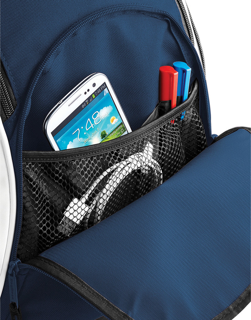 The magenta Bagbase Teamwear Backpack, shown from the side to highlight its slim design.