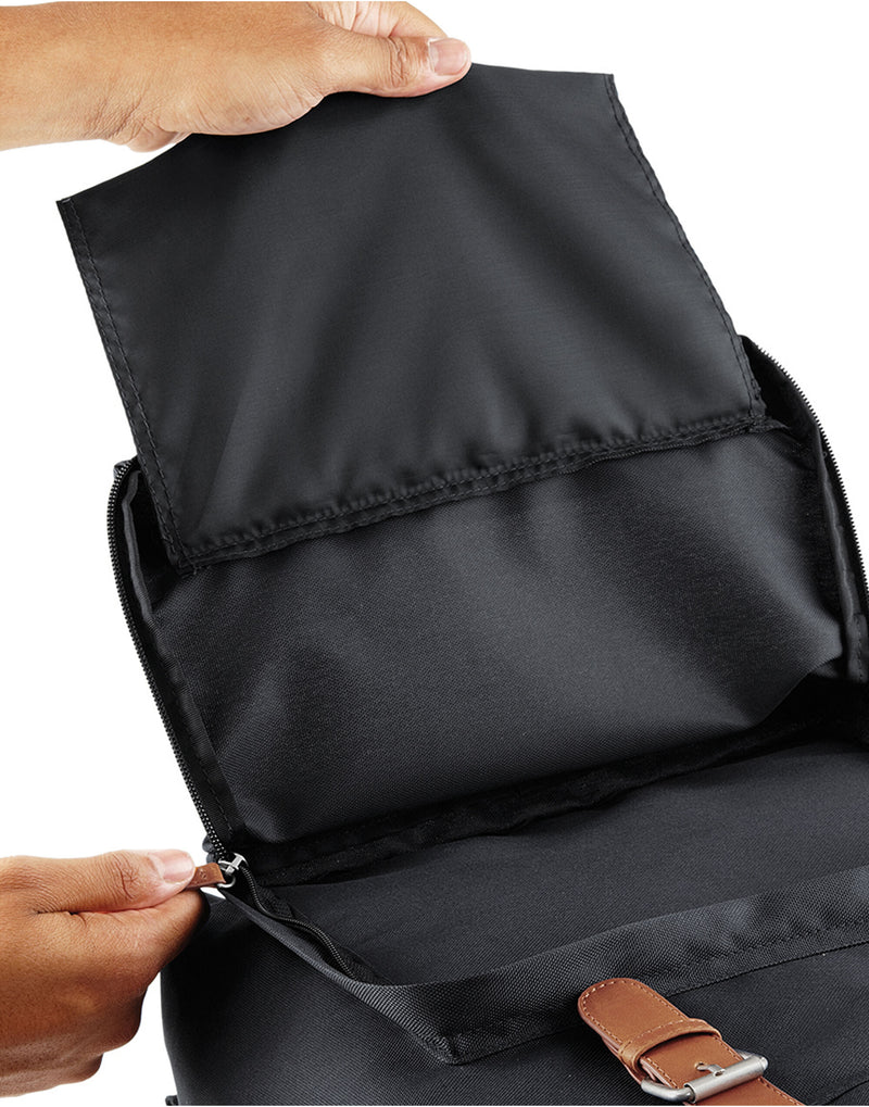 Side profile of the Bagbase Vintage Laptop Backpack, highlighting the padded back panel and grab handle.
