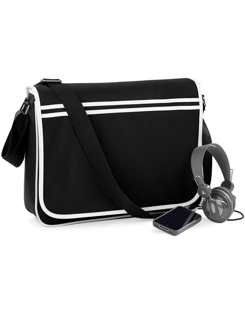 Front view of the black Bagbase Retro Messenger bag, featuring white piping and an adjustable shoulder strap.