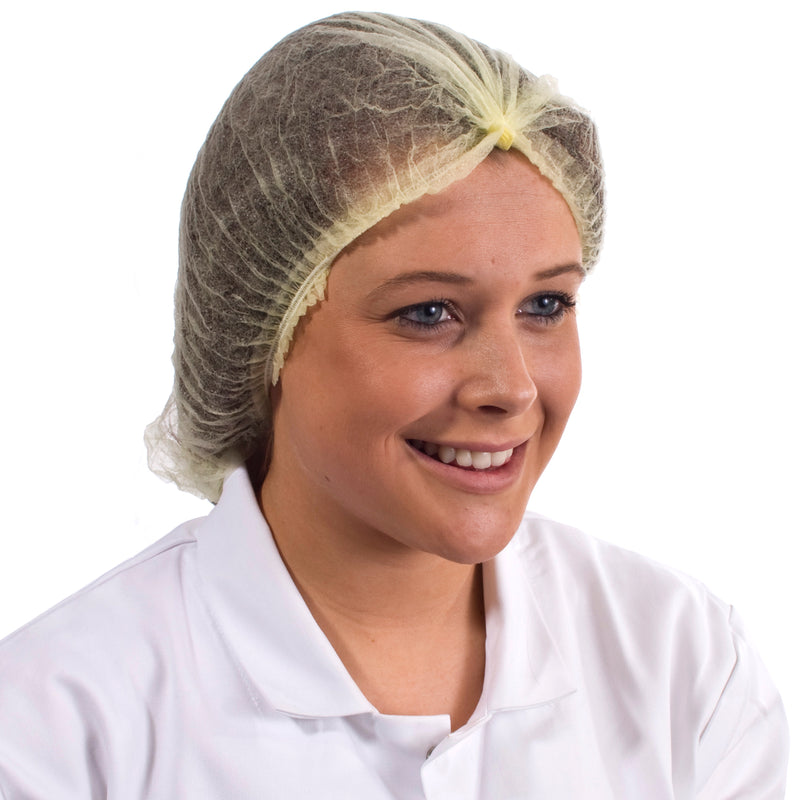 Yellow disposable mob cap, non-woven material, designed for hygiene in food and medical settings.