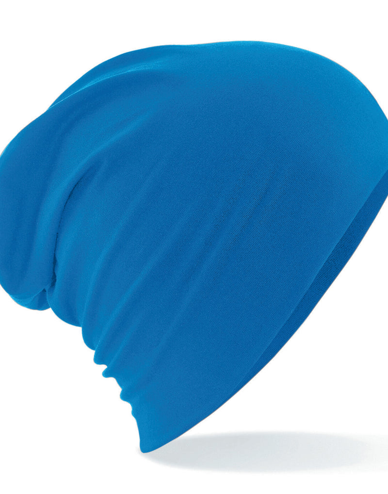 Sapphire blue Beechfield B368 athleisure cap, shown from the side.