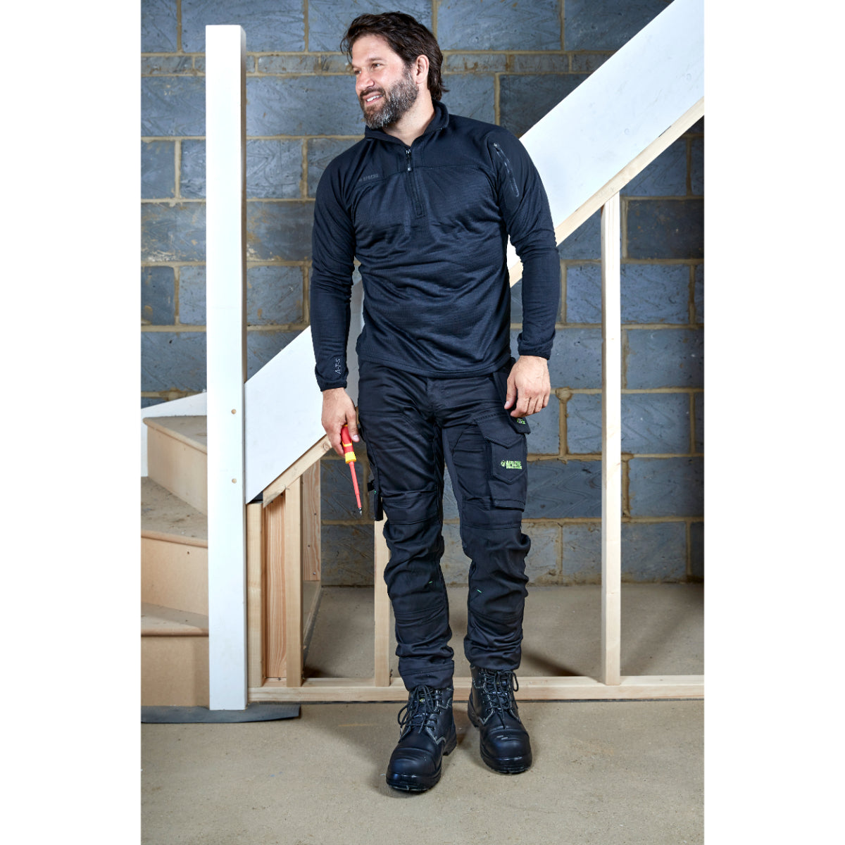 Angled shot of the grey Apache ATS fleece, highlighting the pockets.
