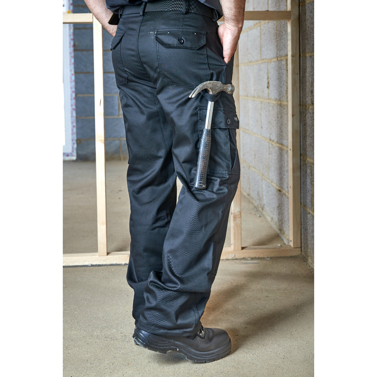Rear view of the functional black Apache Industry work trousers.
