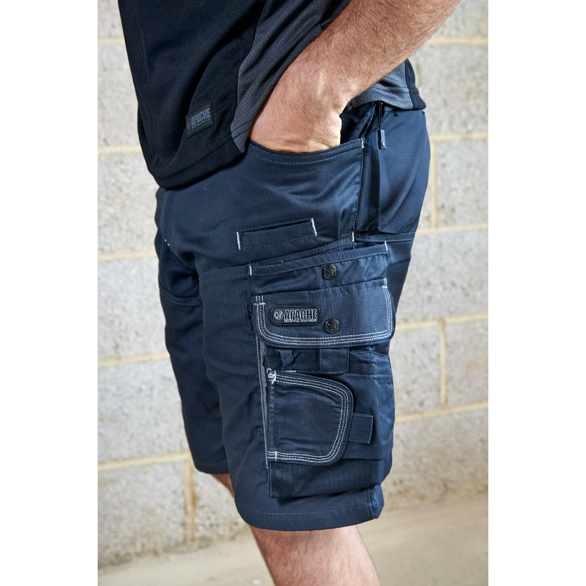 Angled view showing the functional design of the khaki ATS cargo shorts.