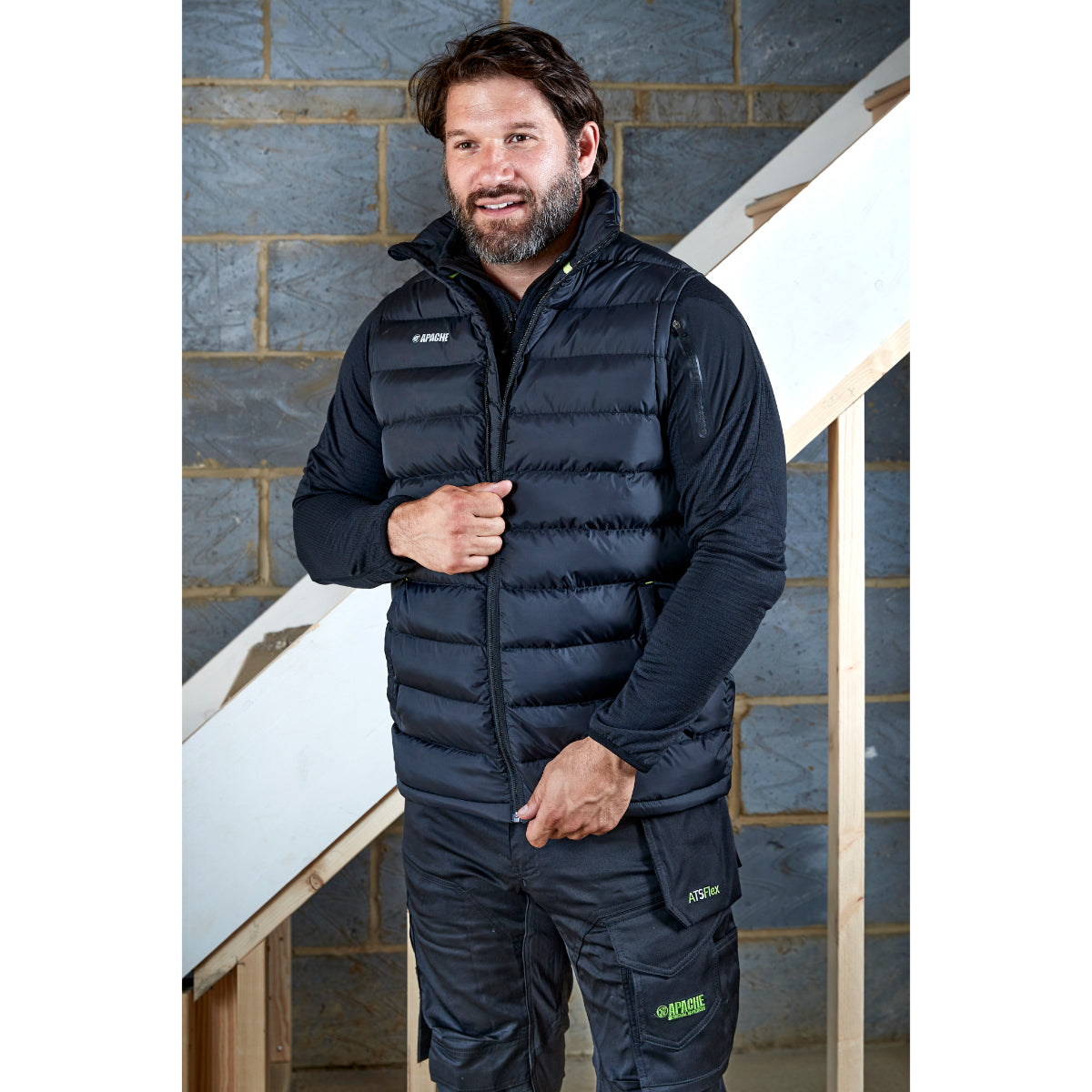 Full-length view of the black Apache ATS gilet for layering.