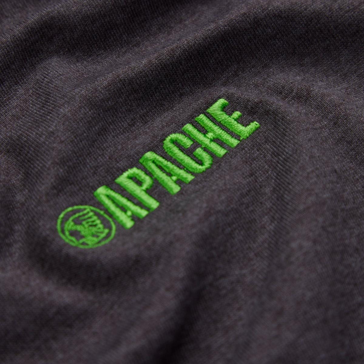 Apache brand logo tastefully embroidered on the sleeve of the charcoal grey Vancouver t-shirt.
