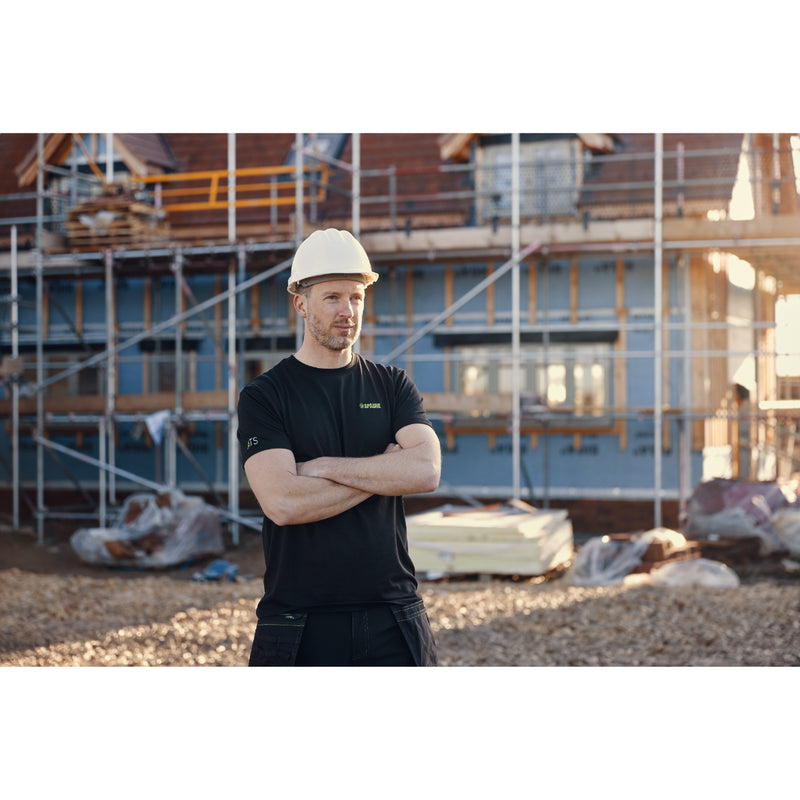 Angled shot displaying the breathable and soft material of the essential black Apache Delta work t-shirt.