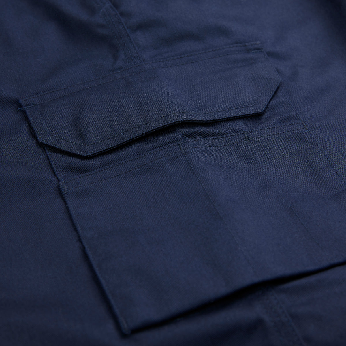 Angled perspective of the durable navy Apache Banff work shorts.