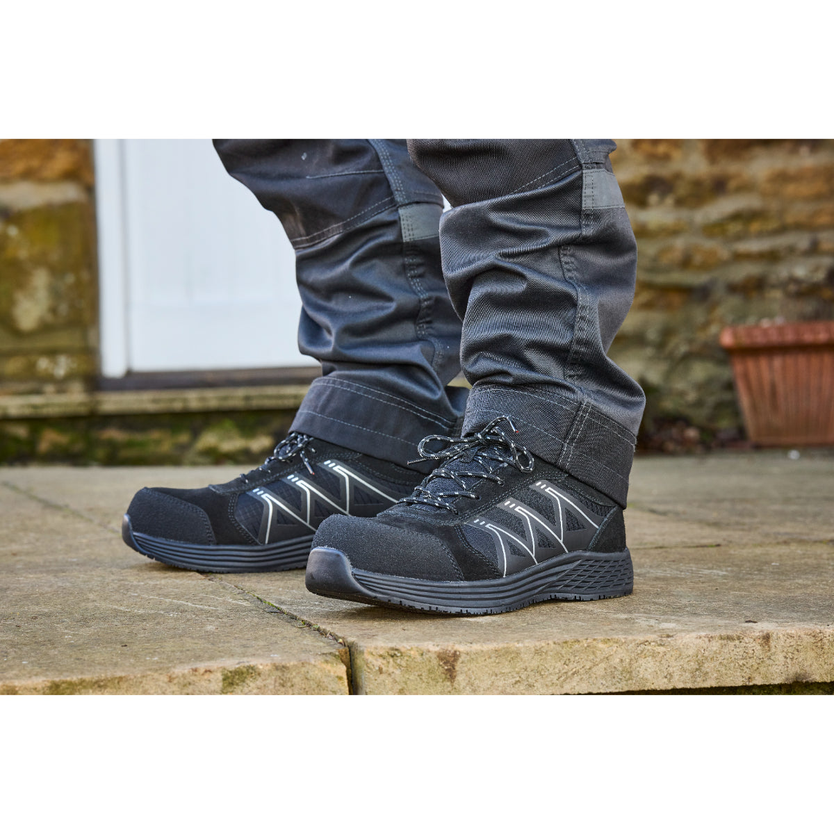 Close-up on the sole and grip pattern of the Apache Venus safety trainer.