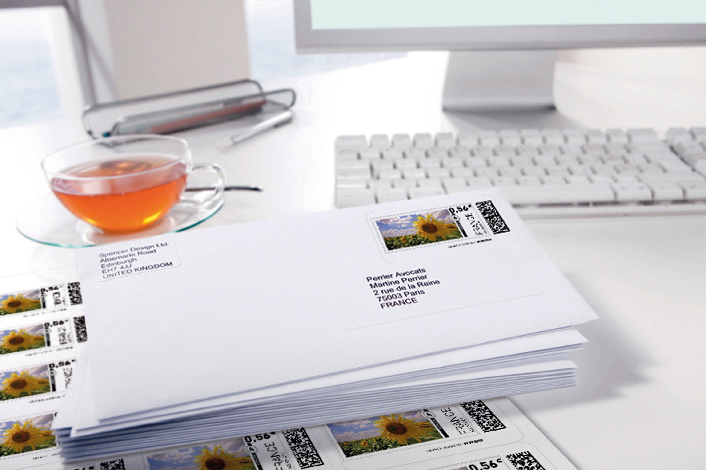A crisp, instant-dry Avery J8160 address label on a white envelope.